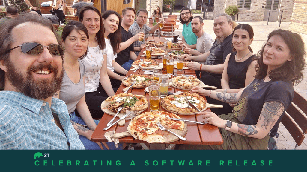 The QA team at 3T celebrating a software release with pizza
