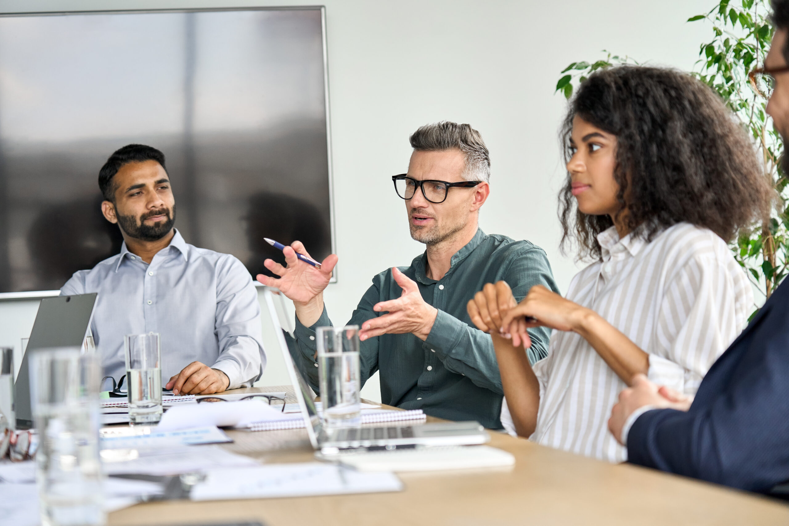 Business people discuss data governance