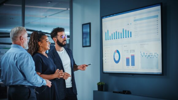 Business people look at data transformation strategies